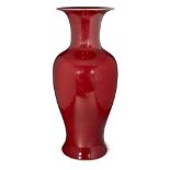 A Chinese porcelain monochrome copper-red baluster vase, late Qing dynasty/early Republic period,