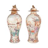 A pair of Chinese export porcelain 'Mandarin palette' vases and covers, Qianlong period, painted