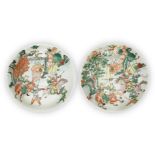 A pair of Chinese porcelain famille verte dishes, Kangxi period, painted with flag bearers and