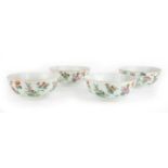 Four Chinese porcelain famille rose bowls, Republic period, painted to the exteriors with cicadas