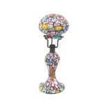 An Italian millefiori glass table lamp, mid 20th century, with mushroom-shaped shade and baluster