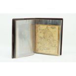 A Brown-Coloured Rexine Bound Album, containing an Illuminated Manuscript Page, 19th/20th century,