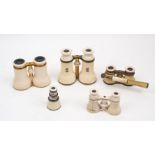 Four pairs of French and English ivory opera glasses, late 19th century, including a pair signed L'