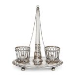 A Continental white metal cruet stand, of oval form, with two pierced holders for cruets and two