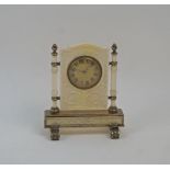 An Edwardian ivory and brass mounted table clock, early 20th century, the later circular dial with