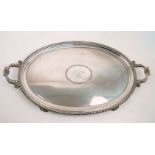 A large Old Sheffield plate twin-handled oval tray, with gadrooned border and inlay to base engraved