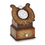 A Regency brass inlaid rosewood pocket watch stand, early 19th century, the base drawer with ivory