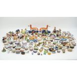 A large collection of trinket boxes and figures to include: Halcyon Days trinket boxes,