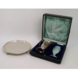 A silver waiter, London, 1923, Josiah Williams & Co., of shaped circular form with beaded border and