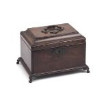 A Georgian mahogany tea caddy, mid 18th century, the lid with bronze cast handle and mounts, opening