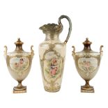 A pair of Doulton earthenware vases and covers, late 19th century, each with twin mask handles,
