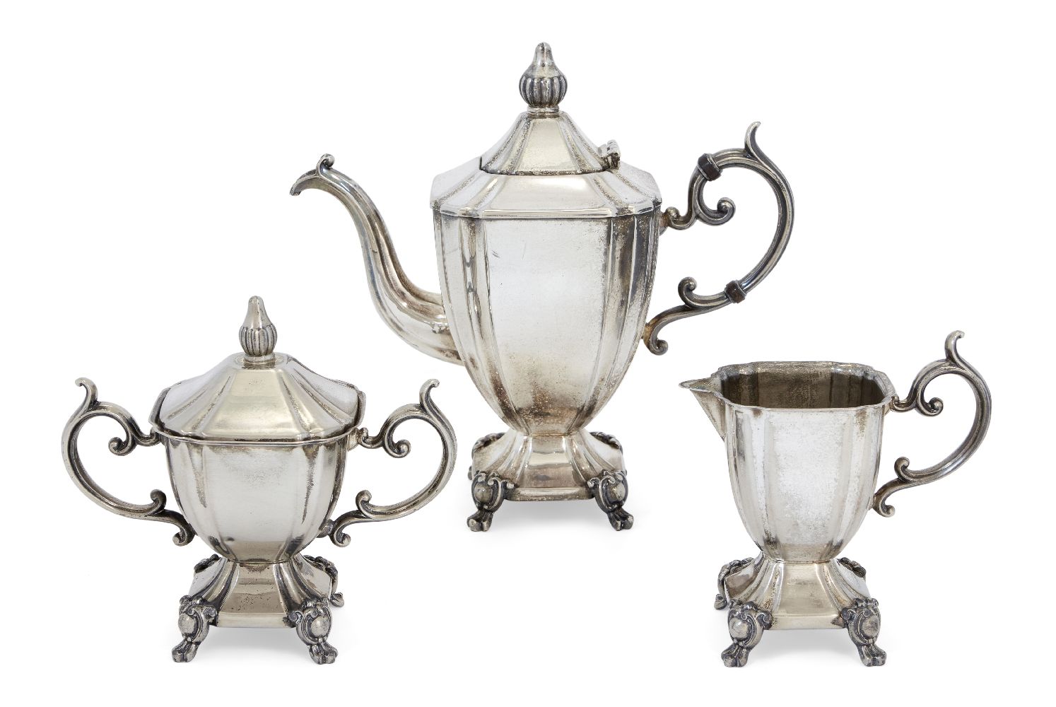 A three piece silver plated coffee service comprising coffee pot, sugar and milk jug, stamped GSC,