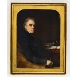 British school, a portrait on ivory of a gentleman, 19th century, depicted seated beside a desk,