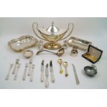 A group of silver plate including a large twin handled oval dish, a ladle, a small bonbon dish and a