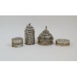 Four various white metal boxes, probably Indian, comprising: an ivory and white metal box with