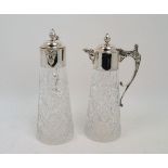 A pair of silver plate mounted cut glass claret jugs, the tapering cylindrical glass bodies to