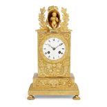 An Empire ormolu mantel clock, early 19th century, the white enamel dial with Roman numerals and