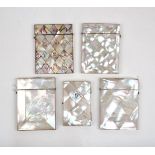 A group of four Victorian mother-of-pearl and abalone card cases, mid-19th century, the openings