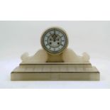 An alabaster and brass mounted mantel clock, late 19th century, the enamel chapter ring with Roman