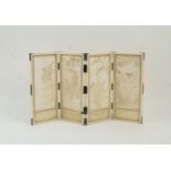 A Japanese Meiji period ivory and white metal mounted four fold table screen, late 19th century, the