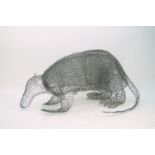 A chicken wire model of an armadillo, 33cm high, 71cm long, 46cm widePlease refer to department