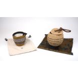 Cesta Collective: a sisal raffia woven lunch pail with canvas inner lining, leather handle and