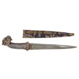 A silver-hilted ram's head dagger (khanjar) North India, 19th century, the steel blade of tapering