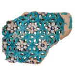 A large Sind turquoise tile jali fragment, Pakistan, 19th century, the pierced design with six-