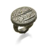 A Mughal nephrite inscribed seal ring dated 1148 AH/1736AD and the name of Ahmed Pasha, the oval
