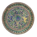 An enamelled silver gilt dish, Lucknow, North India, 18th century, of shallow circular form,