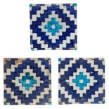 Three geometric Multan tiles, Sind, Pakistan, 19th century, of square form, underglaze painted in