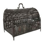 A Mughal openwork brass bird cage, India, 19th century, of casket form with domed lid, on four feet,