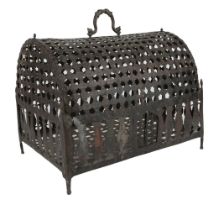 A Mughal openwork brass bird cage, India, 19th century, of casket form with domed lid, on four feet,