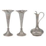 An engraved silver batchelor’s wine flask and two vases, Kashmir, India, 19th century, the flask