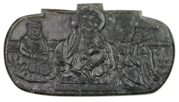 A Sikh carved jade pendant depicting Guru Nanak with Bala and Mardana, India, early 20th century, of