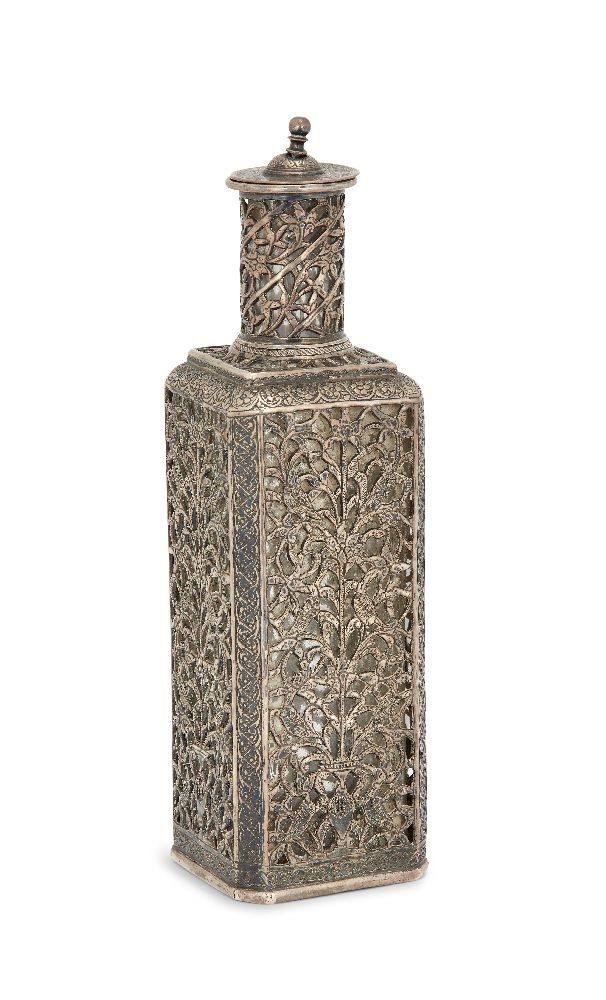 A silver and glass perfume bottle, India, 19th century, of square form, the clear glass bottle