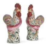 A pair of Chinese export porcelain famille rose figures of cockerels, Qianlong period, modelled as