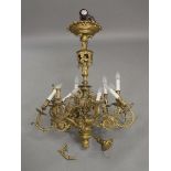 A Victorian style brass twelve branch chandelier, 100cm high four arms snapped