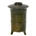 A Chinese terracotta green glazed granary jar, Han dynasty, the cylindrical body incised with two