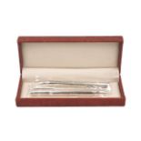 A cased pair of silver ballpoint pens, London, 2014, SJ, designed with engine turned pattern to