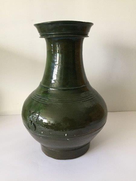 A Chinese pottery green-glazed vase, hu, Han dynasty, the pear-shaped body decorated with moulded - Image 3 of 9