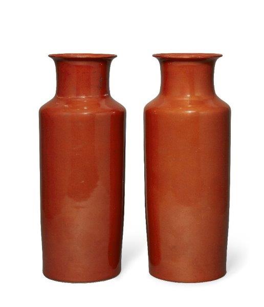 A pair of Chinese porcelain coral-glazed vases, Republic period, of cylindrical form with straight