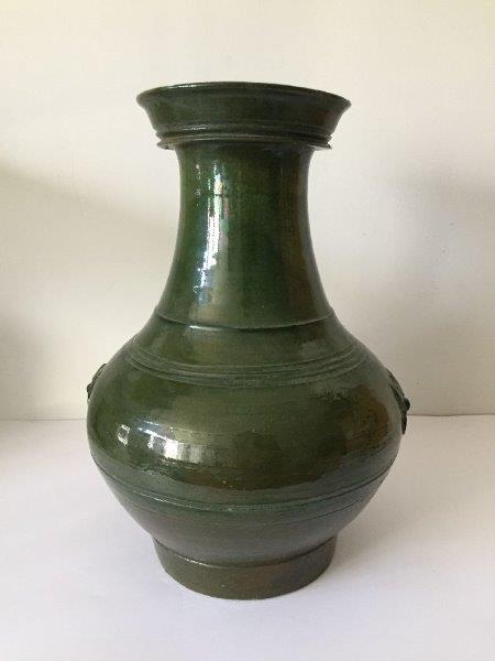 A Chinese pottery green-glazed vase, hu, Han dynasty, the pear-shaped body decorated with moulded - Image 2 of 9