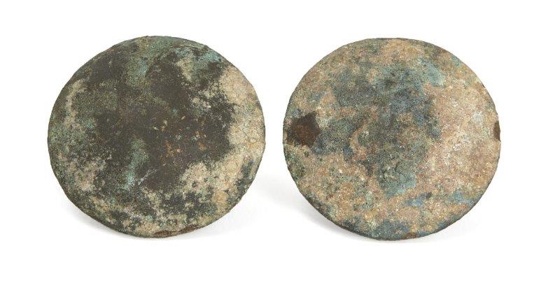 Two Chinese bronze circular buttons, Han dynasty, of convex circular form, 3.5cm diameter (