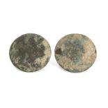 Two Chinese bronze circular buttons, Han dynasty, of convex circular form, 3.5cm diameter (