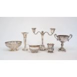 A group of silver comprising: a candlestick with twin branch candelabra attachment, Birmingham,
