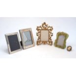 A group of five photo frames comprising: two silver plated rectangular examples (12.9 x 18cm and