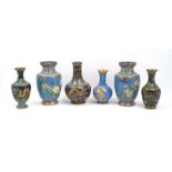 Six Chinese cloisonné enamel vases, 20th century, with a pair of blue-ground vases decorated with