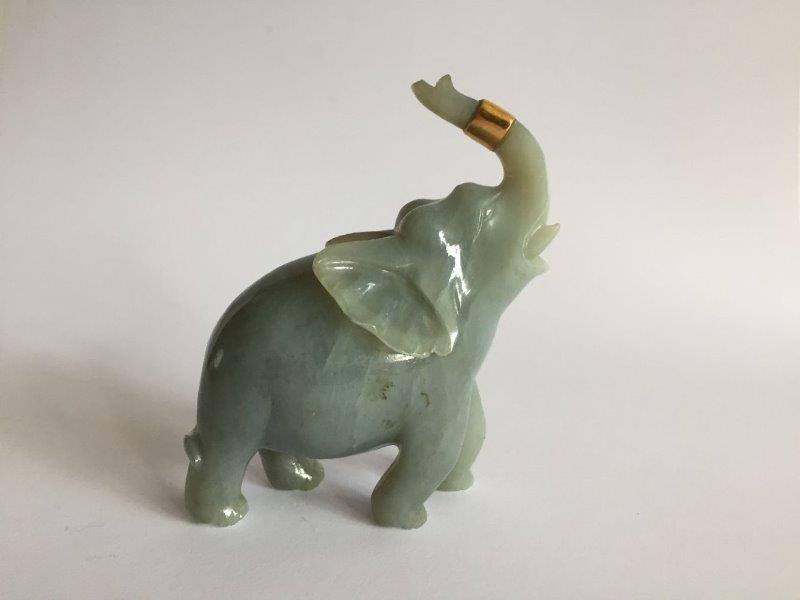 A Chinese jadeite figure of an elephant, early 20th century, carved with its head tilted back and - Image 2 of 6