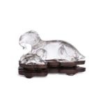 A Chinese rock crystal 'rams' figure group, early 20th century, carved as a recumbent ram and